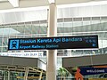 Papan petunjuk stasiun di depan Bandar Udara Internasional Kualanamu