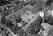 Oslo handelsgymnasium i Parkveien 65 ble rekvirert av tyskerne før OHG fikk flyttet inn i 1940, men har vært skolens tilholdssted siden krigens slutt Flyfoto: Widerøe, 1951