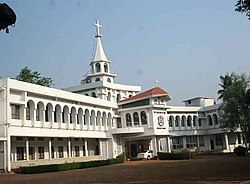 Large, white two-storey building