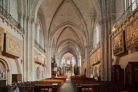 The nave and choir seen from inside the west front, showing the tapestries