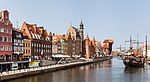 Gdansk waterfront and an old-style ship in the channel