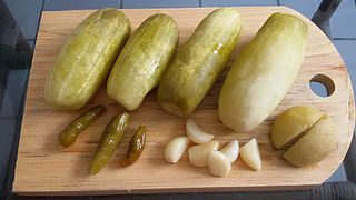 Pickled apple along with other vegetables.