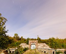 Photographie d'un clair de lune avec un long temps de pose, permettant de rendre visibles les couleurs