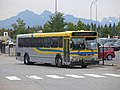 A regular-length high-floor commuter bus