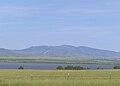 Canyon Ferry Lake in foreground as seen from U.S. Highway 12 near Townsend, Montana. Big Belt Mountains in background.