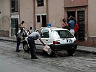 PNR car, a Peugeot 106, being cleaned.