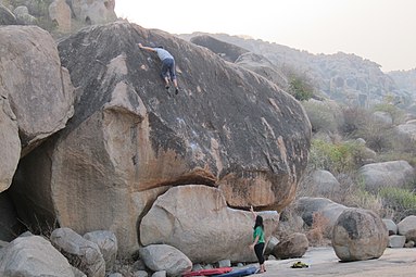 Highball bouldering, in Hampi, India