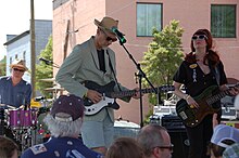 Southern Culture on the Skids perform in Raleigh, NC, 17 April 2010. Left to right: Dave Hartman, Rick Miller, and Mary Huff.