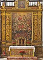 Altar in Iglesia de la Concepción, Santa Cruz de Tenerife. Top: Trinity; Mid-top: Mary, John the Baptist, Holy family; Mid: archangel Michael; Lower: Saints interceding; Bottom: souls undergoing fiery purgation, still with worldly attachments (shackles) and venial sins (snakes).