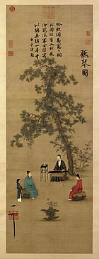 A long, vertically aligned painting of a several people listening to music under the shade of a tree. At the center of the painting, about a third of the way up from the bottom, a man in a green robe sits playing a stringed instrument that is built into a desk shaped container. To his left and right, further towards the bottom of the page, sit two men in robes, one on each side, listening to the music. A woman is standing behind the man on the left. The entire top half of the painting is dominated by a thin, angular tree, and a block of text above it.