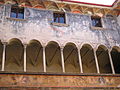 Affresco del cortile interno del Palazzo Besta