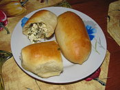 Pyrizhky / pirozhki stuffed with quark and herbs