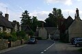 The centre of Wytham, with the village shop on the left and the White Hart pub on the right