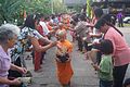 Image 51Buddhist novices receiving joss sticks. (from Culture of Thailand)