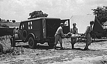 Training for the removal of wounded, Greenville, South Carolina, July 1943.