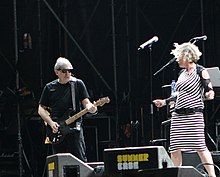 Photo of singer and guitarist performing at a music festival in Barcelona