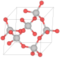 Estructura cristalina del α-cuarzo (las bolas rojas son de oxígeno y las grises de silicio)