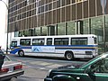 A GMC Classic high-floor bus at Burrard Station. (Running route #210)