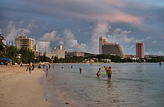 Beach, with modern buildings in the background