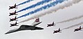 Image 15Concorde (and the Red Arrows with their trail of red, white and blue smoke) mark the Queen's Golden Jubilee. With its slender delta wings Concorde won the public vote for best British design. (from Culture of the United Kingdom)