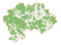 Mapa konturowa gminy Wielbark, blisko centrum na lewo u góry znajduje się punkt z opisem „Głuch”