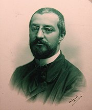 Foto de Josep Puig i Cadafalch signada pel fotògraf (cap al 1900).