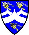 a chevron embowed - Azure; a chevron embowed between two chevronels embowed in fess, argent, all between three prayer wheels bendwise or - Hilary, New Zealand