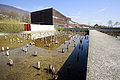 The Laténium building; the bassin of the foreground represents the level of the lake 15 000 years ago, with the pilotis of the neolithic.