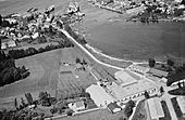 Tønsberg Reperbane 1968 med Kaldnes Mekaniske Verksted i bakgrunnen. Foto: Widerøe/Vestfoldmuseene