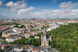 Hasenheide on the western outskirts of Neukölln with St. John's Basilica