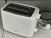 A white plastic toaster