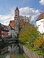 the church St Michael seen from a bridge across the Kammel in Krumbach