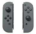 Pilkos spalvos „Joy-Con L“ ir „Joy-Con R“ pulteliai