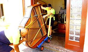 Trolley used to carry a baby grand piano over steps