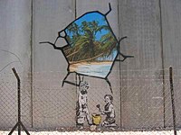 Schildering van Banksy op de Muur in Bethlehem, 2005