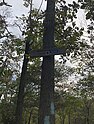 A trail marker on the north end of west rock ridge state park in Hamden Connecticut. The marker shown is for the Regicides trail, which is the main trail on the ridge.