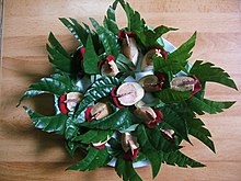 A Phoenix wing shaped- betel leaf plate in Vietnam.