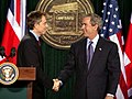 Prime Minister Tony Blair and President George W. Bush conducting a press conference at Camp David, 2001.