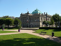 Bibliothèque nationale et universitaire at Strasbourg, stone building with portico by a park