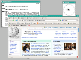 twm, il window manager predefinito di X11, mentre gestisce Firefox, un terminale e Xclock