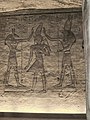 Seth (left) and Horus (right) adoring Ramesses in smaller temple