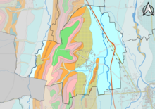 Carte montrant en couleurs le zonage géologique simplifié d'une commune