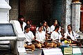 Image 47Schoolgirls and boys playing khrueang sai in front of a temple (from Culture of Thailand)