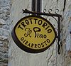 Trattoria sign in Toscana