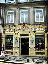 Art Nouveau azulejos on a shop in Porto.