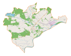 Mapa konturowa gminy Połaniec, blisko centrum na lewo znajduje się punkt z opisem „miejsce zbrodni”