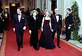 President Ronald Reagan and First Lady Nancy Reagan with Prime Minister Margaret Thatcher and Denis Thatcher at the beginning of an official dinner at the White House, 1981.