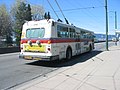 An electric trolley bus, at the Granville Street Bridge in Vancouver. They are expected to be replaced with a new fleet of low-floor trolley buses between 2006 and 2008. (Running route #7)