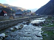 The river Răcătău flowing through Măguri-Răcătău