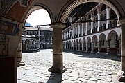 View of the courtyard and the arched outer corridors